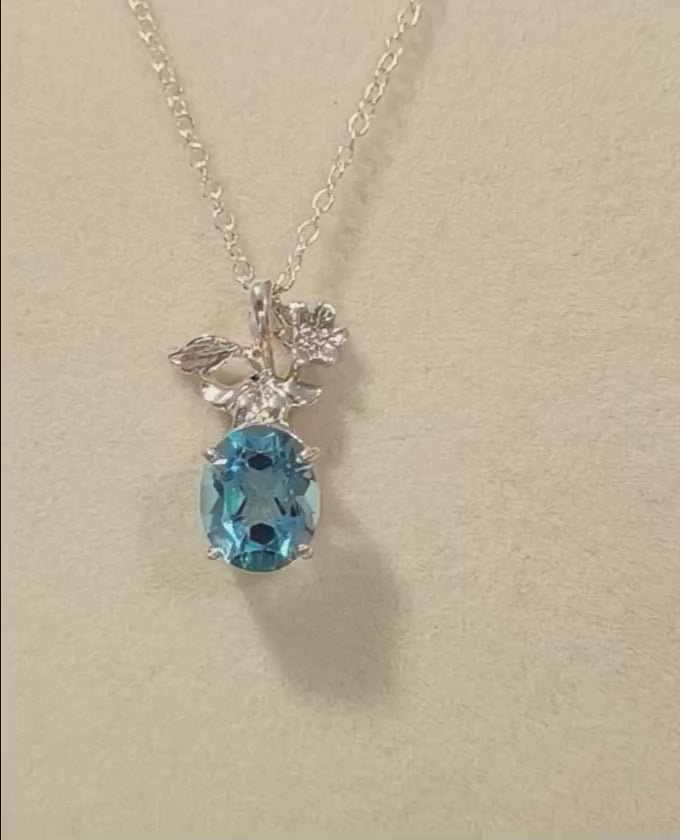 Blue Topaz Flower Pendant